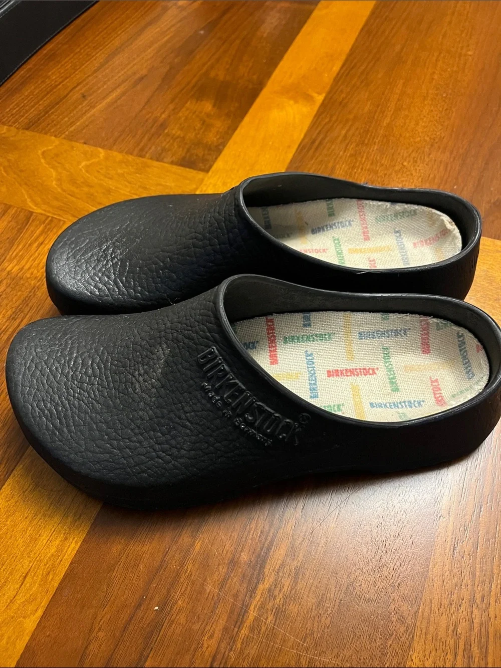 Birkenstock Black  man’s Slip-On Clogs with Logo Insole, 41 European, 26.5 USA